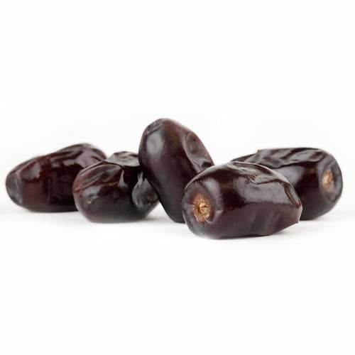 pile of dates on white background